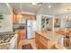 Bright kitchen with a large island, stainless steel appliances, and granite countertops at 6559 Musette Ave, Las Vegas, NV 89139
