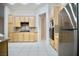 Updated kitchen featuring stainless appliances, granite counters, and light wood cabinetry at 66 Sunset Bay St, Las Vegas, NV 89148