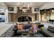 Inviting lobby area with comfortable seating, a stone fireplace, and tasteful decor at 66 Sunset Bay St, Las Vegas, NV 89148