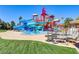 Fun-filled community water park featuring slides, splash pad, and seating area for a perfect Gathering day at 66 Sunset Bay St, Las Vegas, NV 89148