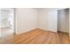 Bedroom featuring wood-look flooring and a closet with sliding doors at 6821 Treble Clef Ave, Las Vegas, NV 89139