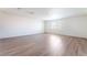 Bright bedroom with hardwood floors and a window at 6821 Treble Clef Ave, Las Vegas, NV 89139