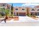 Charming two-story home with a well-maintained lawn and a two-car garage at 6821 Treble Clef Ave, Las Vegas, NV 89139
