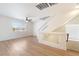 This loft has wood floors, a ceiling fan, and natural light at 6821 Treble Clef Ave, Las Vegas, NV 89139