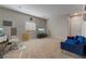 Versatile bonus room with neutral carpet, ample space for furniture, and natural light at 6837 Dragonfly Rock St, Las Vegas, NV 89148