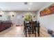 Bright dining area features a modern table set and access to the backyard at 6837 Dragonfly Rock St, Las Vegas, NV 89148