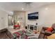 Comfortable living room features a modern entertainment center and cozy leather seating at 6837 Dragonfly Rock St, Las Vegas, NV 89148