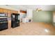 View from the kitchen showing the living room and fireplace at 688 Arrowhead Canyon Dr, Henderson, NV 89002