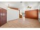 Spacious living room featuring tile flooring, neutral walls, and ample natural light at 688 Arrowhead Canyon Dr, Henderson, NV 89002