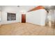 Open-concept living area with tile floors and neutral color scheme at 688 Arrowhead Canyon Dr, Henderson, NV 89002