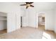 Main bedroom with closet, bathroom, and ceiling fan at 688 Arrowhead Canyon Dr, Henderson, NV 89002