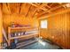 Interior view of a storage shed with built-in shelving and wooden construction at 688 Arrowhead Canyon Dr, Henderson, NV 89002