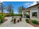 Outdoor kitchen, covered patio, and sparkling pool in a landscaped backyard at 729 Sir James Bridge Way, Las Vegas, NV 89145