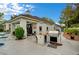 Home exterior featuring an outdoor kitchen, covered patio, and a sparkling pool at 729 Sir James Bridge Way, Las Vegas, NV 89145