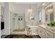 Luxury bathroom with large glass shower, free standing tub, and double sink vanity with lots of counter space at 729 Sir James Bridge Way, Las Vegas, NV 89145