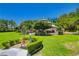 Picturesque park with a gazebo, lush lawn, trimmed hedges, and benches for relaxing and enjoying the outdoors at 729 Sir James Bridge Way, Las Vegas, NV 89145