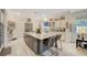 Gourmet kitchen with a large center island, stainless steel appliances, and ample cabinet space for storage at 729 Sir James Bridge Way, Las Vegas, NV 89145