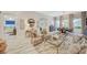 Inviting living room with ample seating and stylish decor, complemented by an open floor plan and abundant natural light at 729 Sir James Bridge Way, Las Vegas, NV 89145
