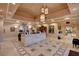 Inviting lobby area with marble floors, reception desk, and decorative lighting at 729 Sir James Bridge Way, Las Vegas, NV 89145