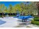 Community playground with colorful play equipment and shaded benches at 729 Sir James Bridge Way, Las Vegas, NV 89145