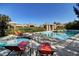 Community pool with hot tub and lounge chairs at 729 Sir James Bridge Way, Las Vegas, NV 89145
