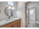 Bright bathroom showcasing a white marble countertop, stylish vanity, and modern fixtures at 7410 Bridlehorne Ave, Las Vegas, NV 89131