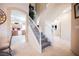 Bright and airy staircase with carpeted steps, providing access to the upper level of the home at 7690 Morning Lake Dr, Las Vegas, NV 89131