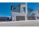 Two-story modern homes with attached garages and sleek exteriors at 9756 Rock Cliff St, Las Vegas, NV 89141