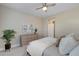 This is a bedroom with neutral paint, carpet, and a ceiling fan at 9903 Spinel Pl, Las Vegas, NV 89143