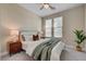 Cozy bedroom with neutral tones, natural light, and stylish furnishings creating a relaxing retreat at 9903 Spinel Pl, Las Vegas, NV 89143