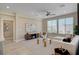 Inviting living area showcasing a entertainment center, comfy seating, and lots of natural light at 9903 Spinel Pl, Las Vegas, NV 89143