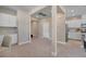 Spacious living area with neutral walls and seamless transition to other rooms at 9903 Spinel Pl, Las Vegas, NV 89143