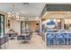 Upscale restaurant area with elegant lighting, stylish seating, and contemporary design elements at 9903 Spinel Pl, Las Vegas, NV 89143