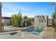 Private outdoor spa with a modern design, surrounded by landscaping, and offering a relaxing retreat at 9903 Spinel Pl, Las Vegas, NV 89143