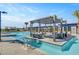 Resort-style pool with sun loungers, cabanas, and palm trees offer a relaxing outdoor oasis at 9903 Spinel Pl, Las Vegas, NV 89143