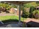 Lush backyard featuring a grass area and mature landscaping, great for outdoor enjoyment at , Las Vegas, NV 89117
