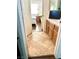 Tiled floors lead from the bathroom into a bedroom with natural light at , Las Vegas, NV 89117