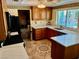 Well-lit kitchen featuring marble countertops, oak cabinetry and stainless steel sink at , Las Vegas, NV 89117