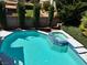 Aerial view of the pristine pool and spa with lush landscaping at , Las Vegas, NV 89117