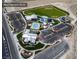 Aerial view of Skye Canyon Park, highlighting the pool, sports fields, fitness center, and parking at 10280 Midnight Meteor Ave, Las Vegas, NV 89166