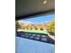 Landscaped backyard with artificial turf, decorative rocks, and stepping stones at 10280 Midnight Meteor Ave, Las Vegas, NV 89166