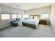 Bright bedroom with multiple windows and ample natural light, creating a serene retreat at 10280 Midnight Meteor Ave, Las Vegas, NV 89166