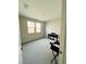 Cozy bedroom featuring neutral walls, plush gray carpeting, and piano at 10280 Midnight Meteor Ave, Las Vegas, NV 89166