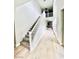 Entryway featuring stairs and a view into the open concept living area at 10280 Midnight Meteor Ave, Las Vegas, NV 89166