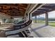 Well-equipped fitness center with treadmills, weights, and scenic views of mountains and green space at 10280 Midnight Meteor Ave, Las Vegas, NV 89166