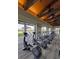Modern fitness center equipped with elliptical machines and views of the park and playground at 10280 Midnight Meteor Ave, Las Vegas, NV 89166