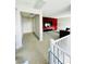 Spacious living room showcases a red accent wall and a modern entertainment center at 10280 Midnight Meteor Ave, Las Vegas, NV 89166