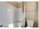 Bathroom showing a shower/tub combo with white tile and decorative shower curtain at 10512 Mann St, Las Vegas, NV 89141