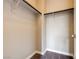 Walk-in closet showcasing built-in shelving and carpet at 10512 Mann St, Las Vegas, NV 89141