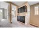 Hallway features built in storage cabinets and leads into a bedroom with neutral color scheme at 10512 Mann St, Las Vegas, NV 89141